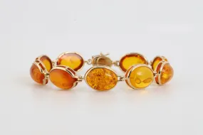 7 14k Yellow Gold 83.34tcw Amber Bracelet (10.48g.)