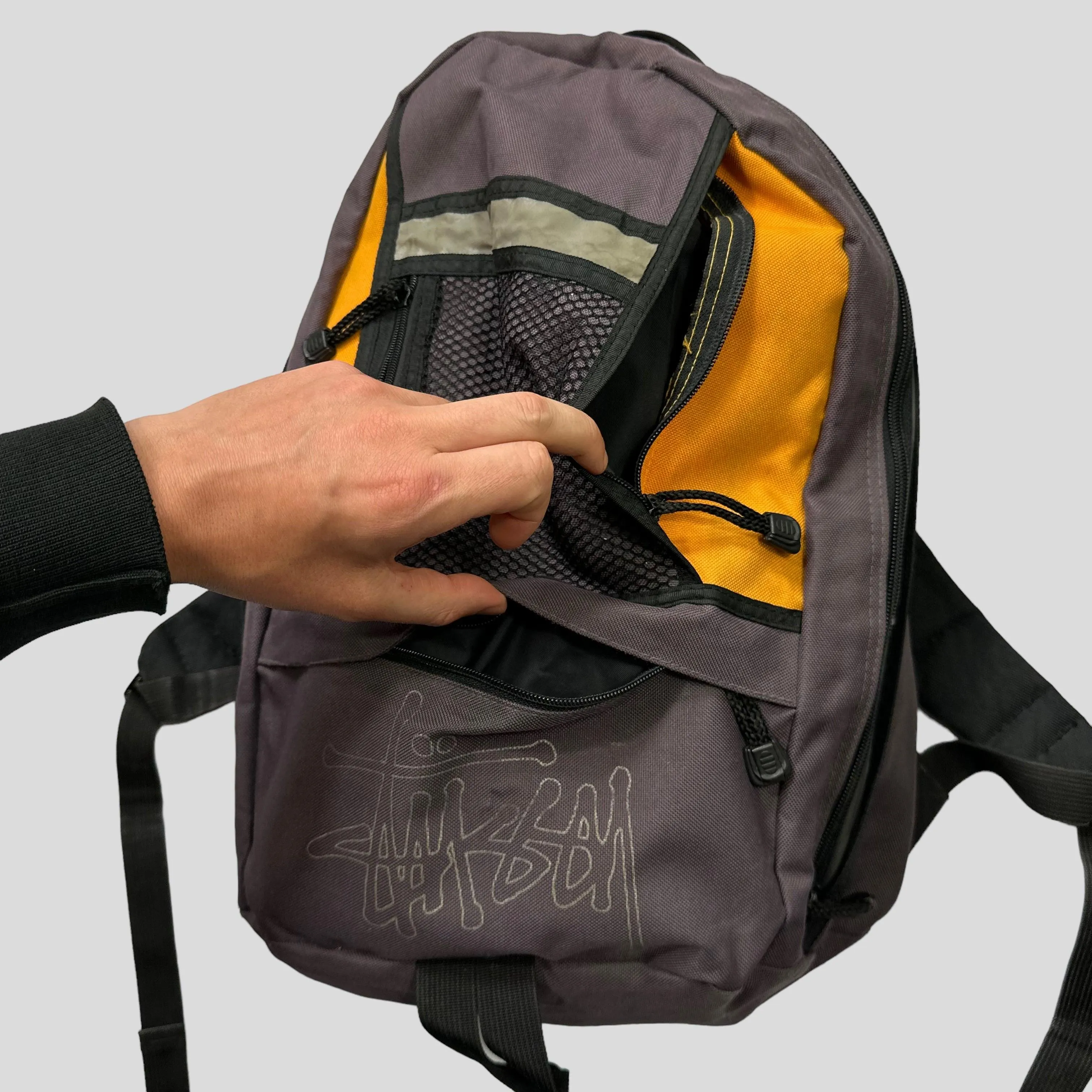 Stussy 90’s Spellout Multipocket Mesh Backpack