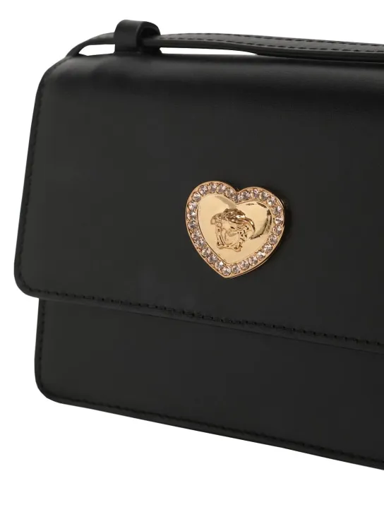 Versace   Leather shoulder bag w/ Medusa detail 